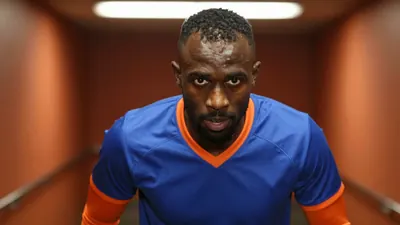 Portsmouth winger Abu Kamara finalized his return to the club after a permanent transfer, citing familiarity and fan...